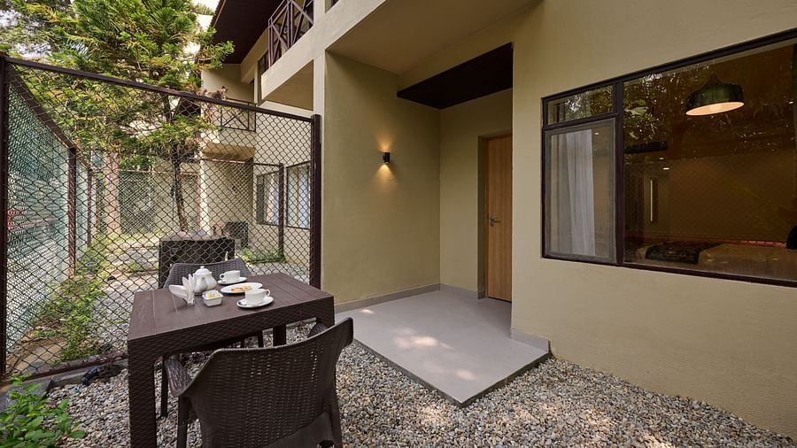 view of the Sit-out area of the Deluxe Room at ABN Sarovar Portico, Jim Corbett