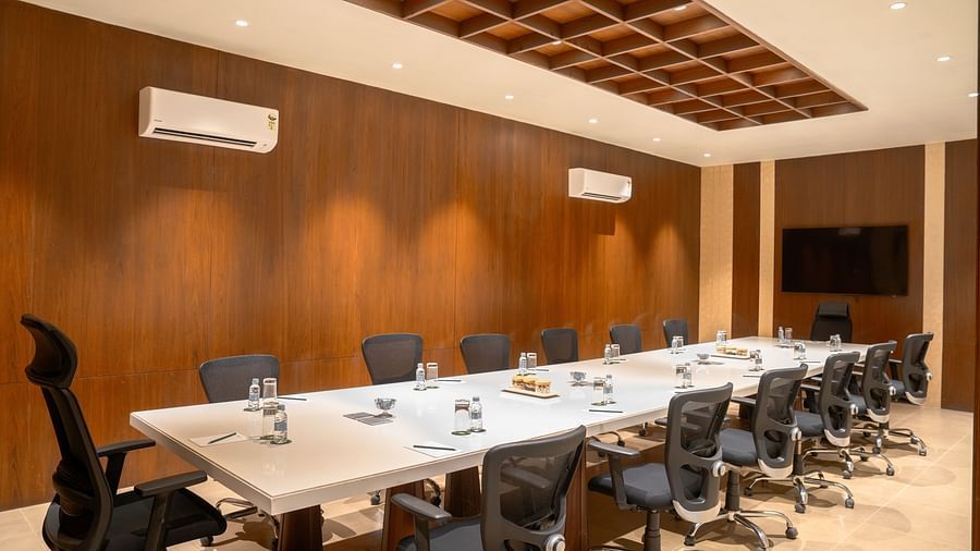 Boardroom seating arrangement in a banquet hall at Ananta Spa and Resort, Ajabgarh