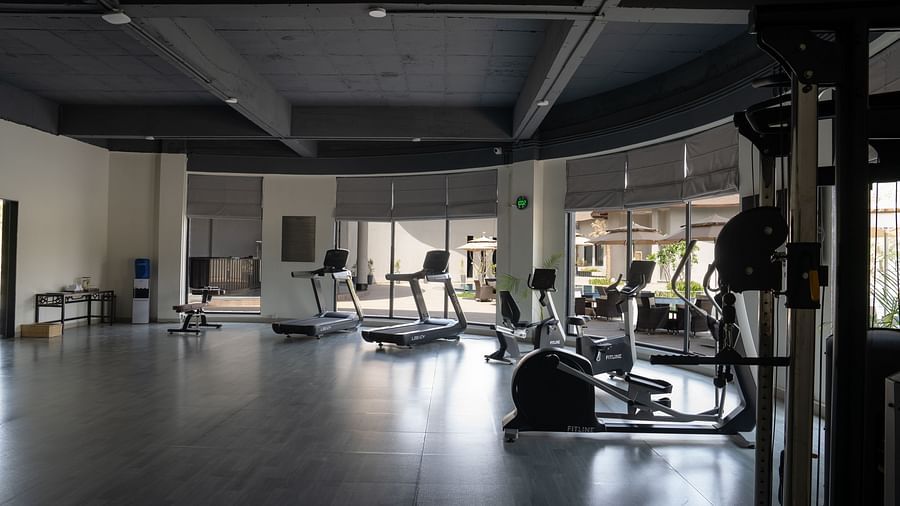 Interior of a gym with several equipments at Ananta Spa and Resort, Ajabgarh 