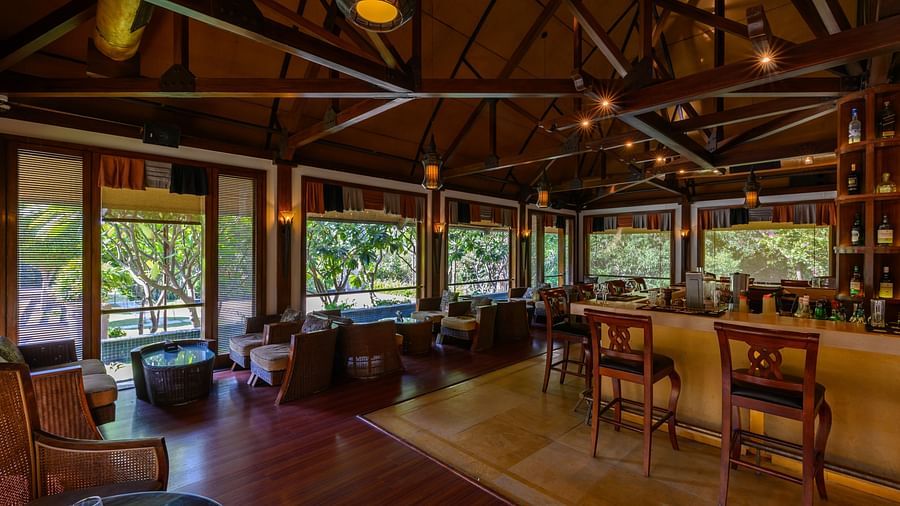 A part of the tastefully decorated bar with the bar table and seating areas at our resort in Pushkar 