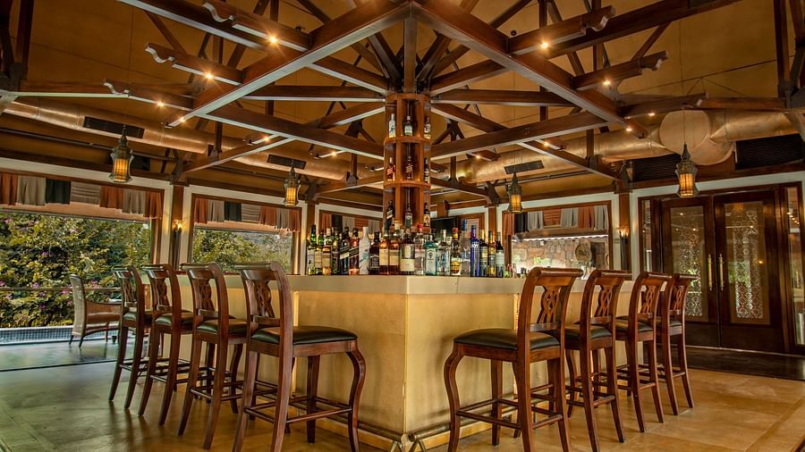 A part of the tastefully decorated bar with the bar table and seating areas at our resort in Pushkar 85