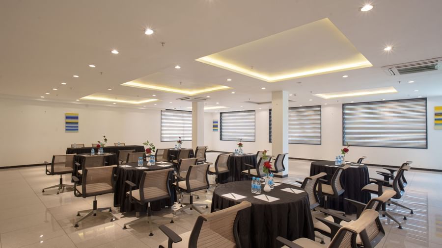 Conference or meeting room set up with tables and chairs for a round-table business meeting at Arawali Ananta Elite, Jaipur.