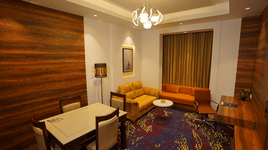 room with separate living area and wooden furnishings