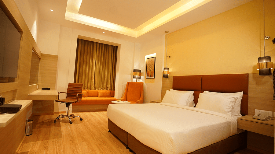 cosy room with king size bed and warm interiors