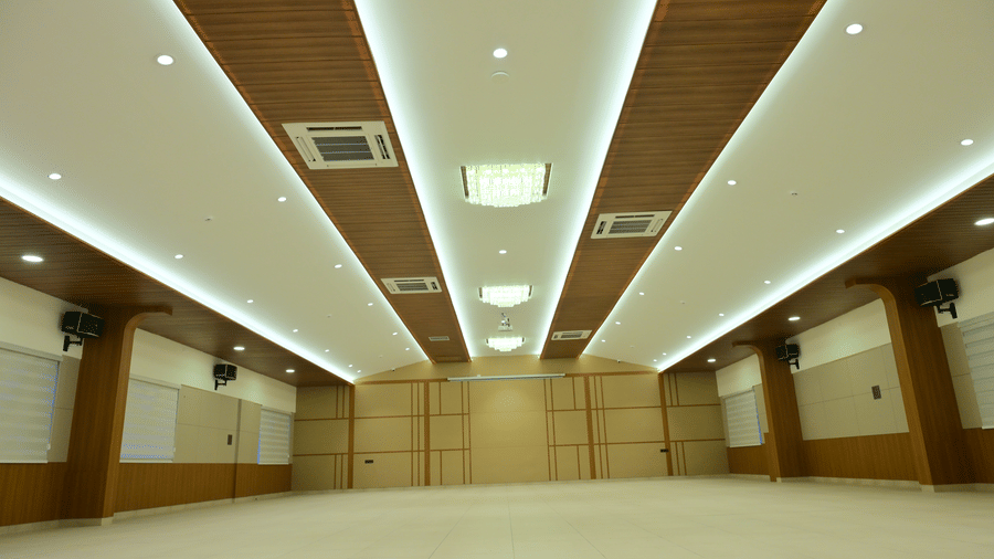 Banquet hall of Bhavanis Vista By Icon featuring an empty floor and ceiling lighting.