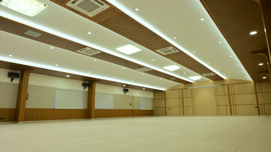 Banquet hall of Bhavanis Vista By Icon featuring an empty floor and ventilation fixtures.
