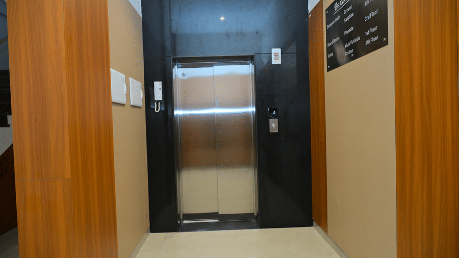 Lift lobby of Bhavanis Vista By Icon featuring doors and a corridor.