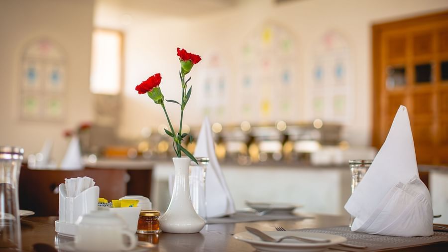 Buena Vista Luxury Garden Spa Resort - a close-up of a dining table at Aurora