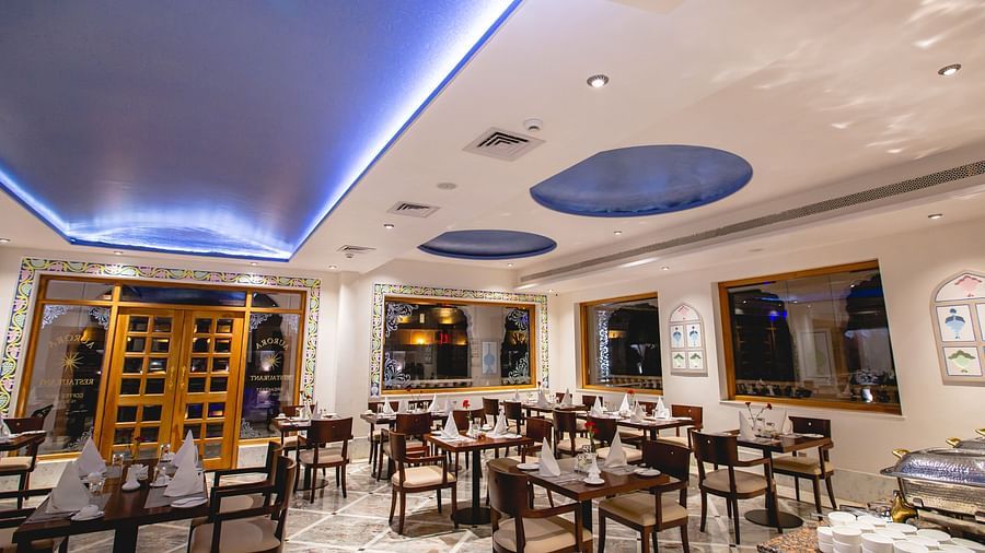 Buena Vista Luxury Garden Spa Resort - indoor seating space at one of the restaurants in Jaipur
