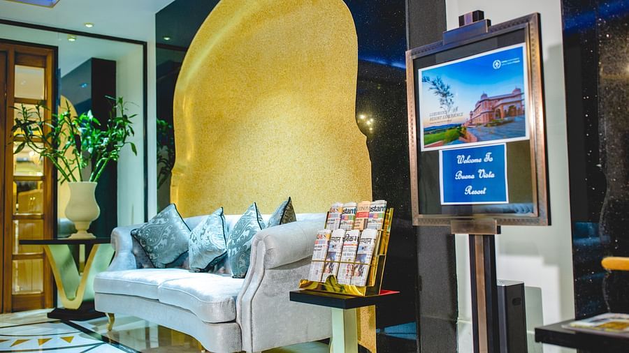 Buena Vista Luxury Garden Spa Resort - a seating sofa with a magazine stand kept at its side in the reception area