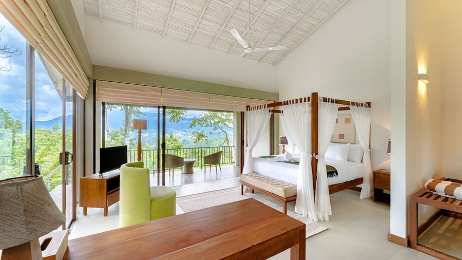 A side view image of our villa with good decor, comfortable furniture and a view of the mountains