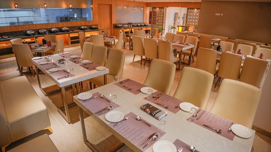the beige interiors of our restaurant in Yelahanka