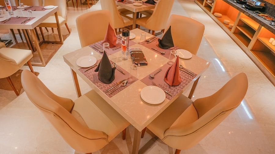 a table for 4 at our restaurant in Bangalore