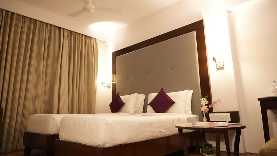 Executive room featuring a cozy bed with bedside lights at Clarks Collection, Bhavnagar