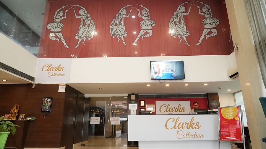 A reception hall featuring a painted wall at Clarks Collection, Bhavnagar