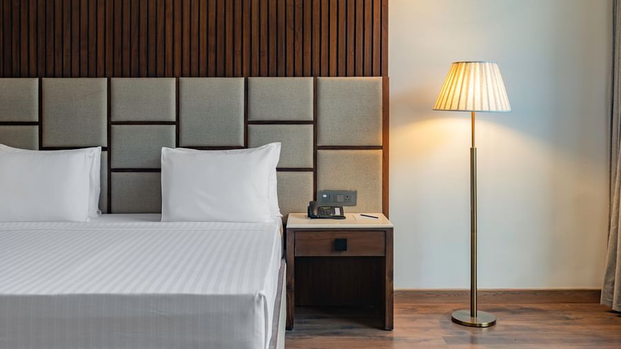 Close up of hotel room with a minimalist design and natural light - Clarks Inn, Dehradun