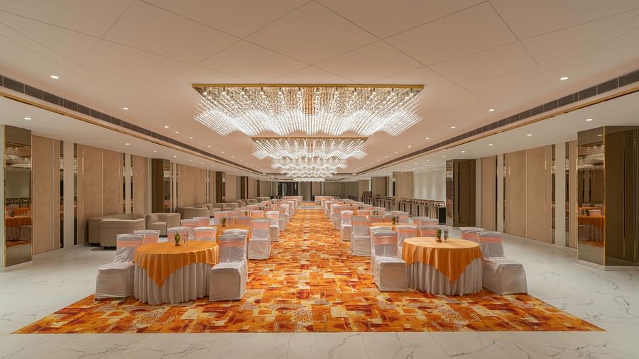 Grand banquet hall with elegant chandeliers.