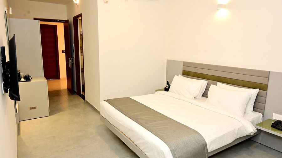 Well lit Standard Room with a double bed and television 5 - Clarks Inn Express, KRS Road, Mysore