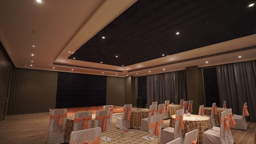 banquet hall with chairs and tables at Classic Sapphire by Ananta