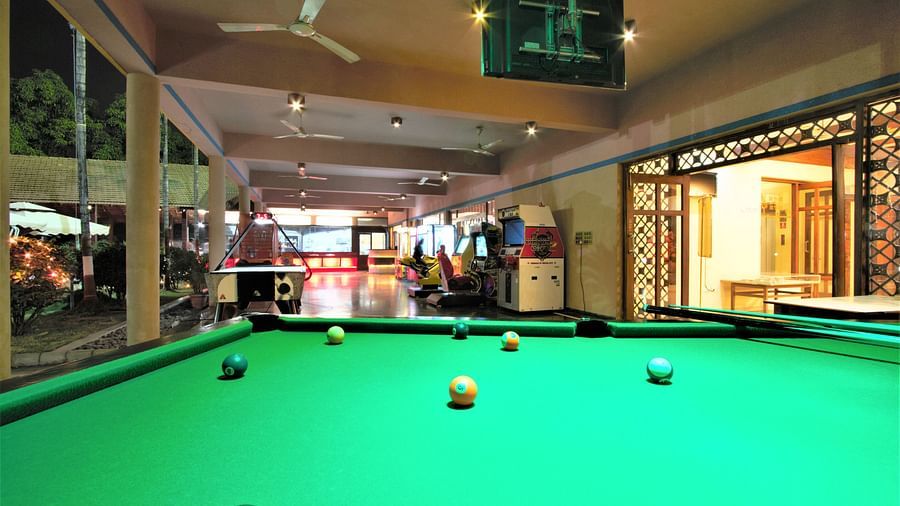 Damanganga Valley Resorts Pvt Ltd - a close-up view of a pool table in the games room