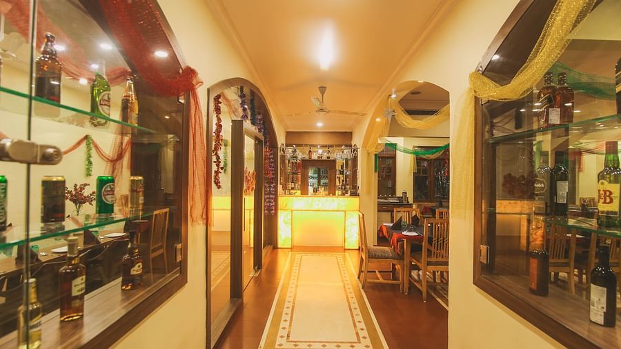 Damanganga Valley Resorts Pvt Ltd - the hallway to the bar counter at Olive Restro Bar in Daman