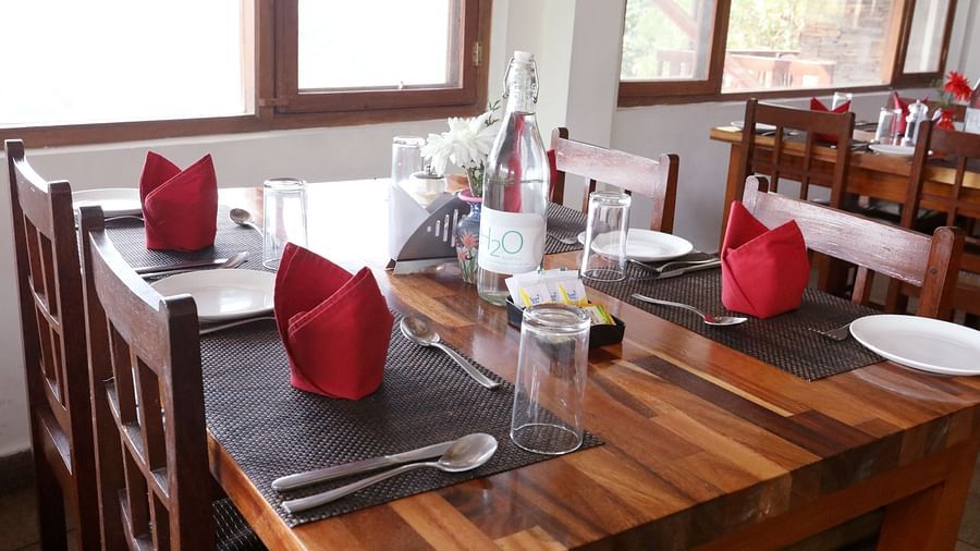 tables and chairs at wishbone restaurant in ooty