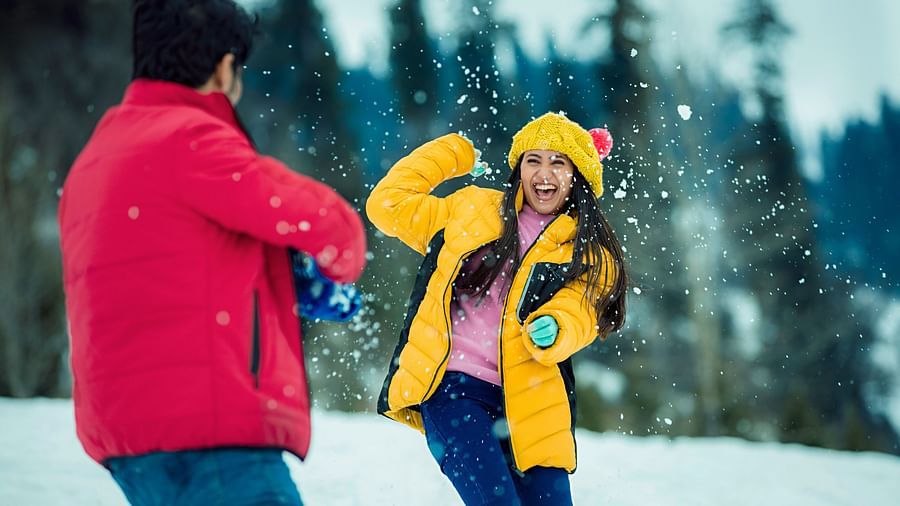 Couple playing in Snow