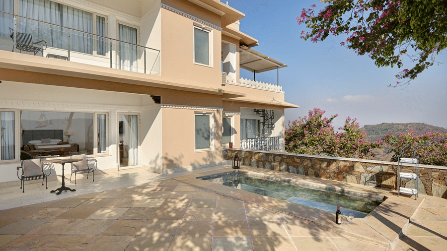Facade of Plunge Pool Suite in Fateh Safari Suites featuring two storey building and a small pool in the ground floor.