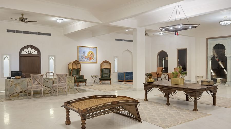 Fateh Vilas Udaipur - interior view of the property's reception area featuring seating options and marble flooring