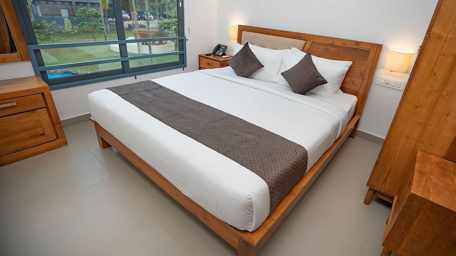 Top view of room with bed and pillows on it at Feel Free Retreat, Wayanad