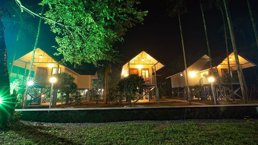 Night view of three properties at Feel Free Retreat, Wayanad