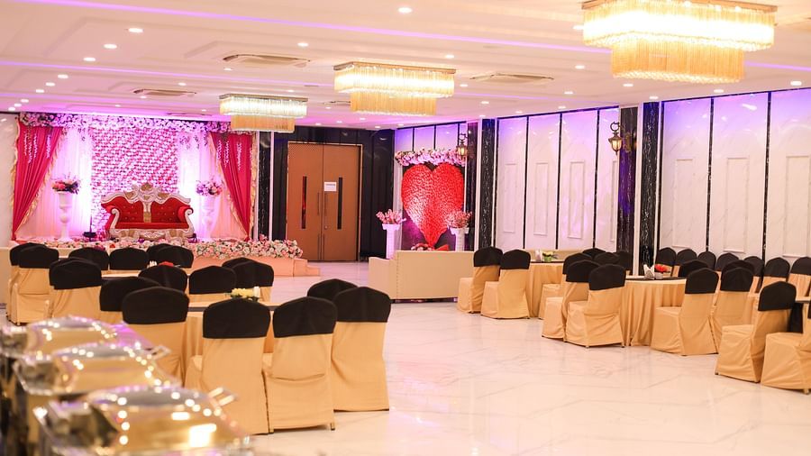 Chairs and a stage at Magnolia A Banquet at Fiori Hotel