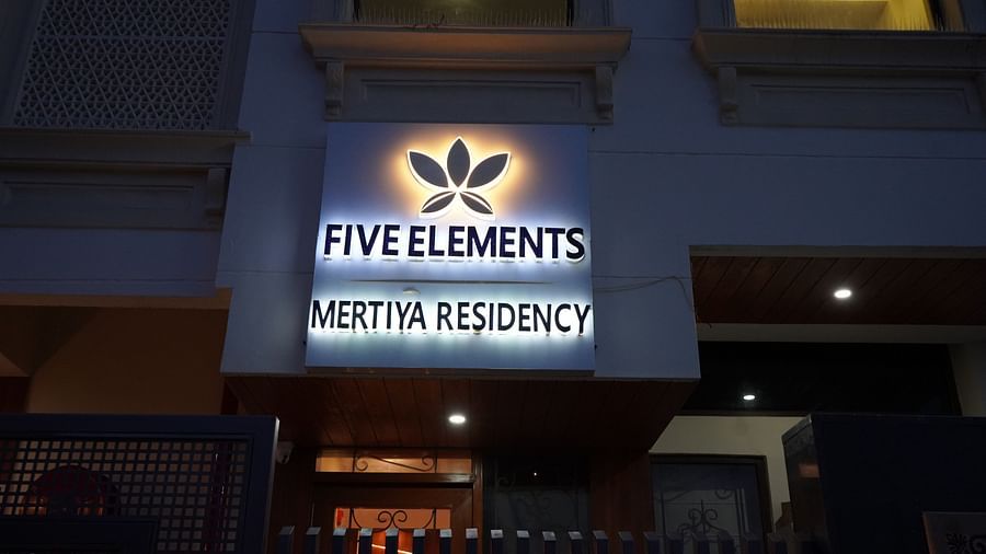 An image of a well lit logo and nameplate of Five Elements Hotel, Jodhpur