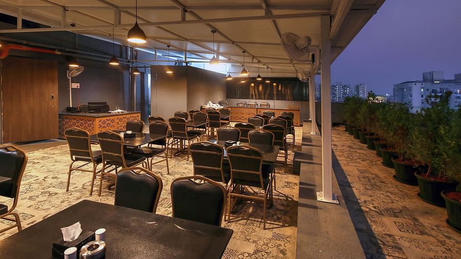 Al-fresco seating arrangement inside hte Restaurant - Magnus Fortune House, Magarpatta