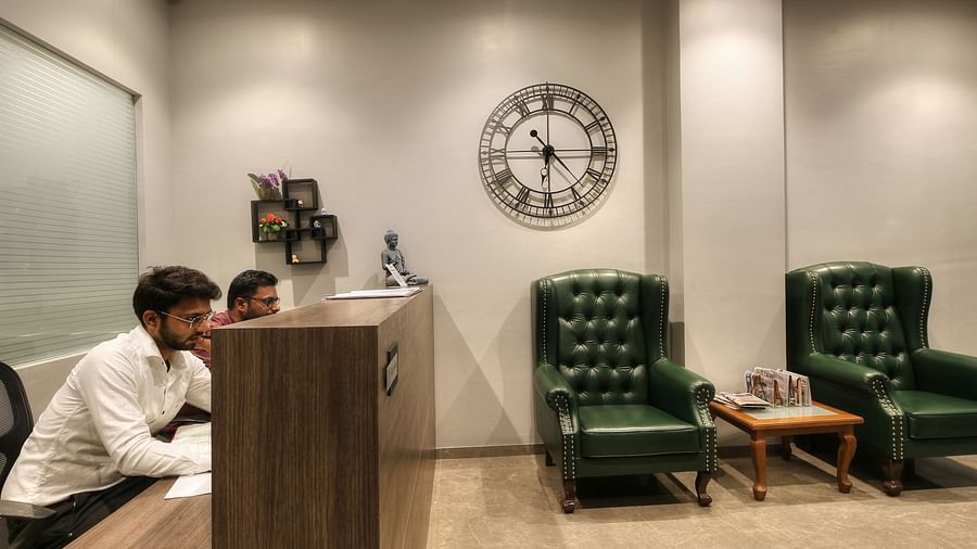 Reception area in view with chairs next to it - Magnus Fortune House, Magarpatta