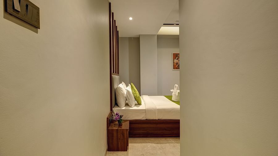 view of the double bed inside Classic AC Room - Fortune House, Magarpatta
