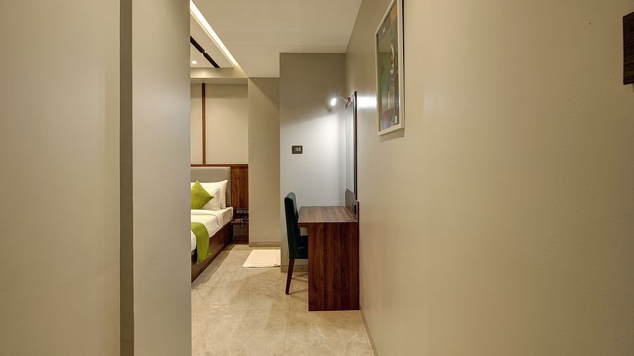 A view of the side table inside Premium Twin Sharing Room - Fortune House, Magarpatta