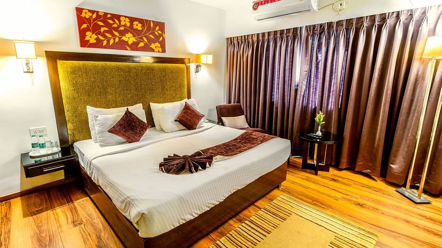 The interiors of the Suite Room features a comfy King size bed - GIS Select