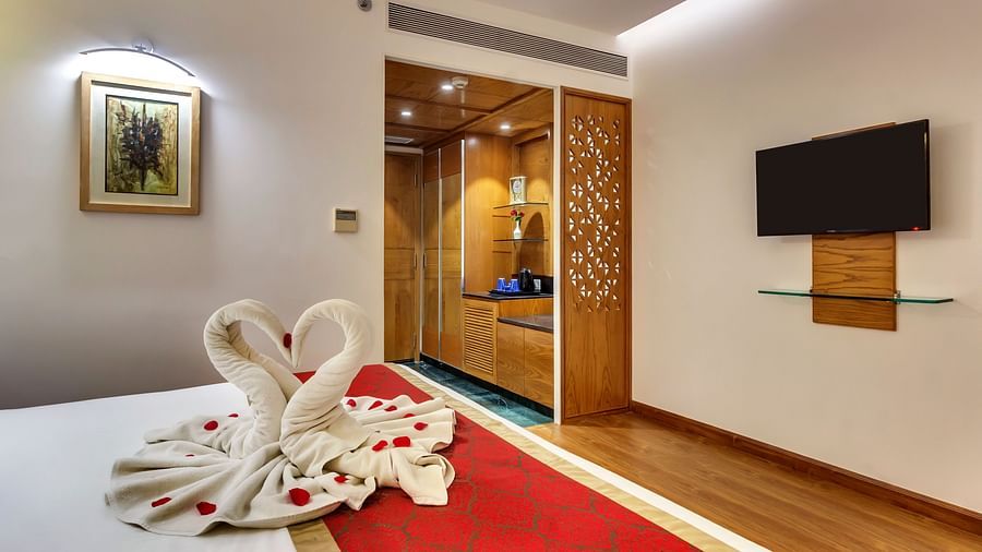 swan towel art on a bed at Golden Tulip New Delhi, Hari Nagar