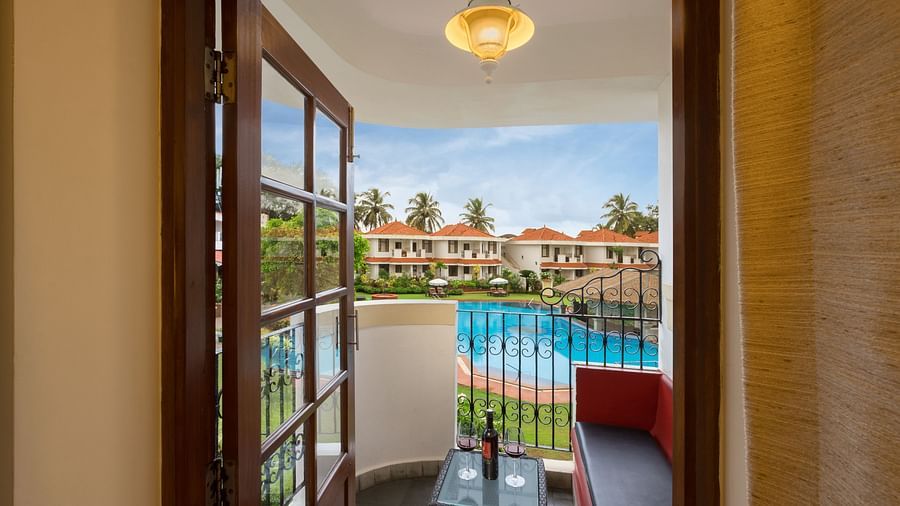 balcony overlooking the magnificent swimming pool at Heritage Village Resorts and spa