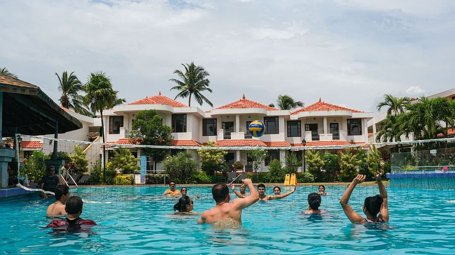 group of people chilling in the pool