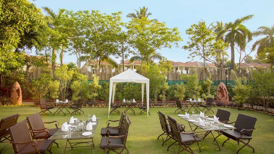 outdoor dining area at heritage village resort and spa