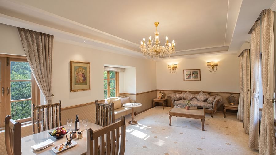 heritage suite with a lavish separate living area and dining table