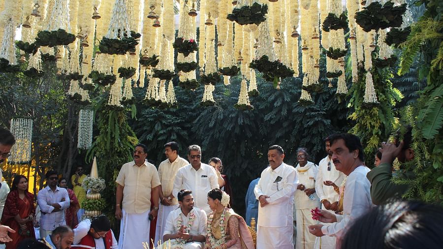 Traditional South Indian wedding ceremony under a flower-adorned canopy at Heritage Village Resorts & Spa, Manesar.