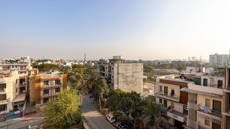 Urban neighbourhood view with residential buildings and greenery from Hotel Bawa, Gurgaon.