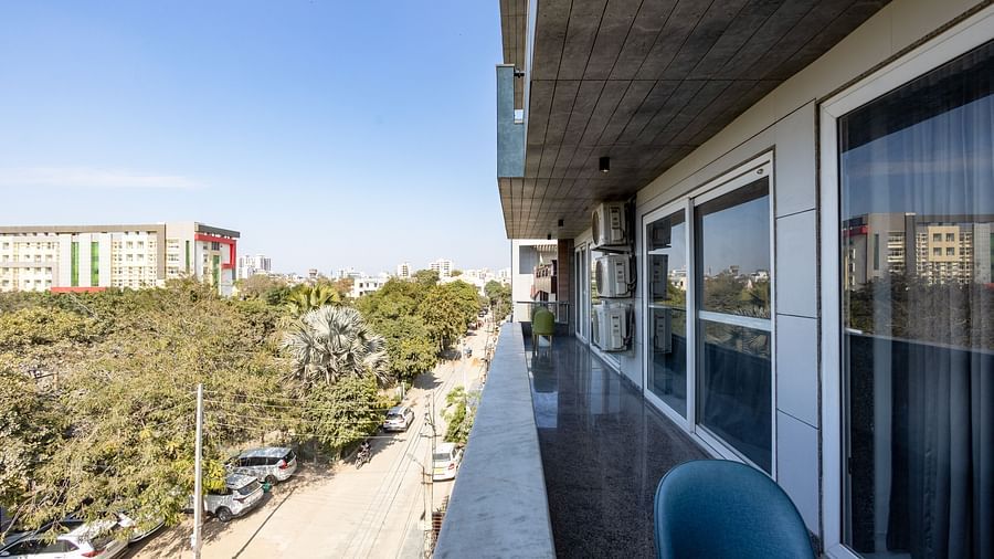 A balcony offering a cityscape at Hotel Bawa, Gurgaon.