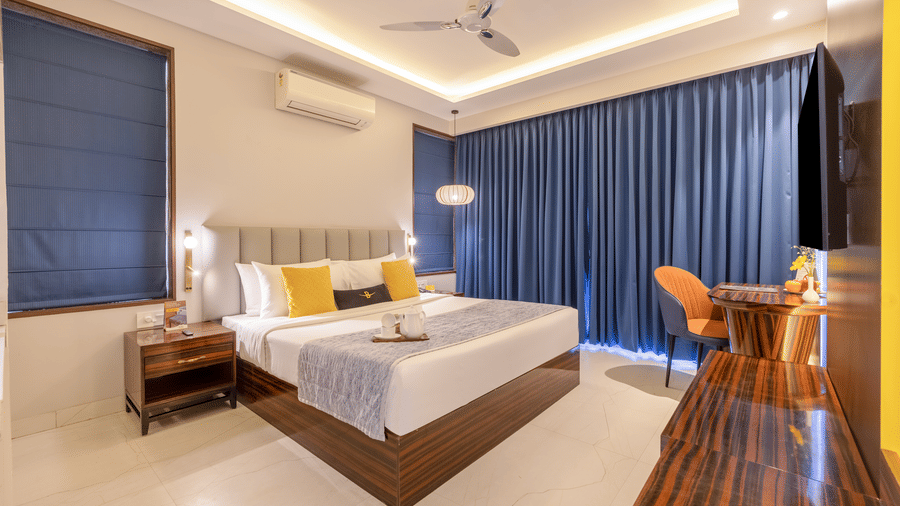 Room interior with coordinated colours, warm lighting, and modern furnishings creating a clean and elegant atmosphere - Hotel Bawa, Gurgaon
