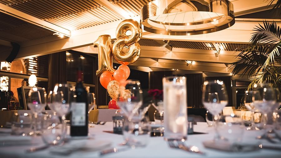 A banquet hall decorated for an 18th birthday party