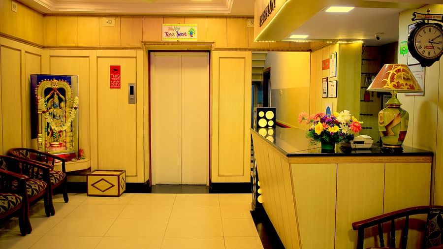 a  view of the reception counter at Hotel Swagath, Bangalore