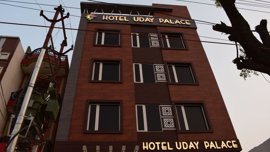 A scenic exterior view of Hotel Uday Palace, the best hotel in Varanasi, set against the sky.